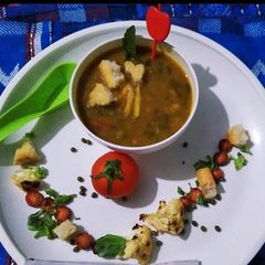 A picture of Green gram beans and veggies soup.