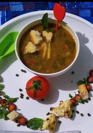 A picture of Green gram beans and veggies soup.