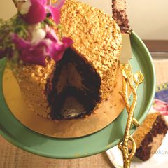 A picture of Chocolate cake with caramel coffee mousse filling.