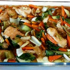 A picture of Dory fillets and vegetables in soy-oyster sauce.