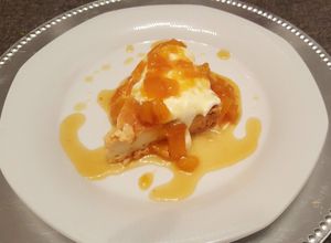 Una foto de Leche asada con crema y mango