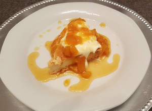 Una foto de Leche asada con crema y mango