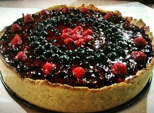 Una foto de Chessecake arándano-frambuesa estilo arcoiris