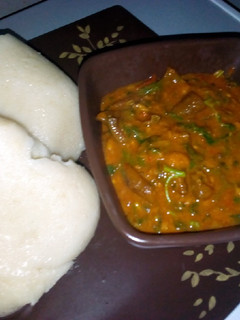 A picture of Tuwan semo with ogbono soup.