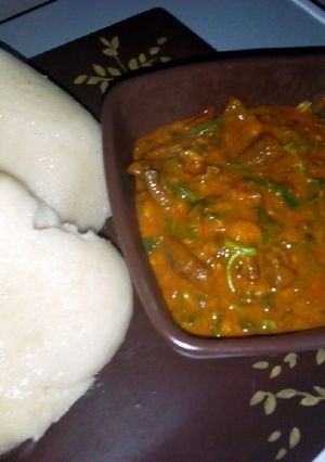 A picture of Tuwan semo with ogbono soup.