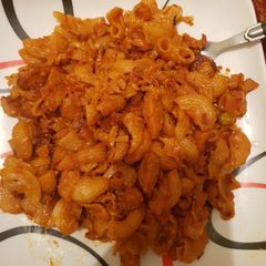 A picture of Leftover cheesy macoroni.