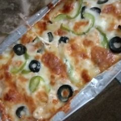A picture of Chicken pizza fries.
