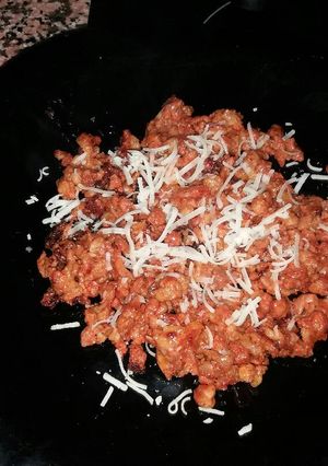 Una foto de Jijas con queso parmesano