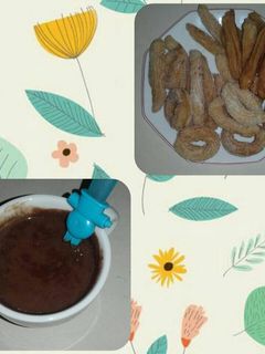 Una foto de Churros con chocolate
