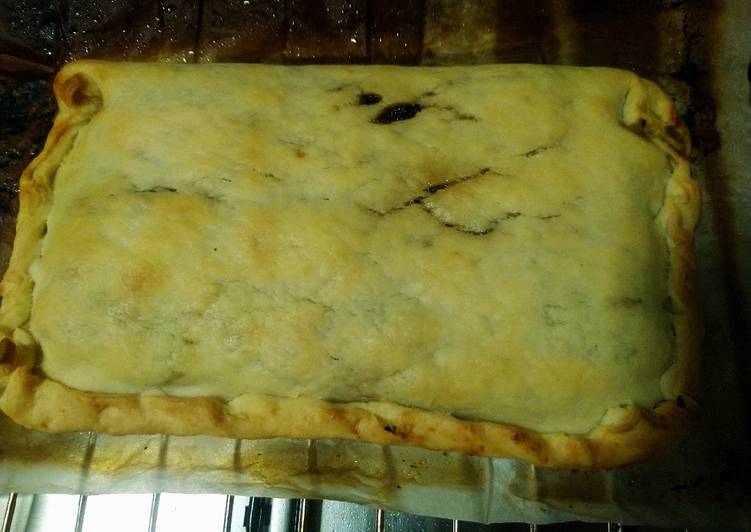 Empanada de morcilla con manzana y queso de cabra