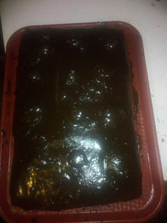 Una foto de Torta rellena de dulce de leche y baño de chocolate