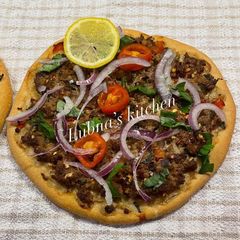 A picture of Homemade Turkish lahmacun:.