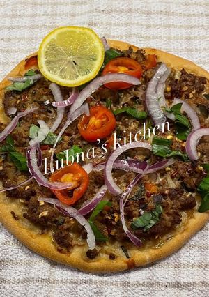 A picture of Homemade Turkish lahmacun:.