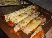Una foto de matambre a la pizza en