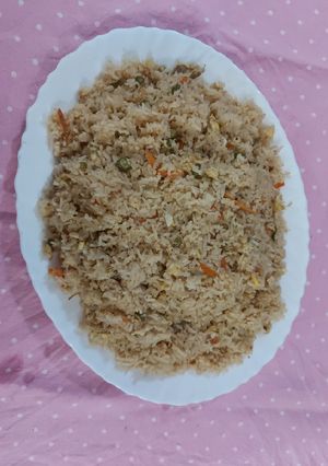 A picture of Chicken fried rice.