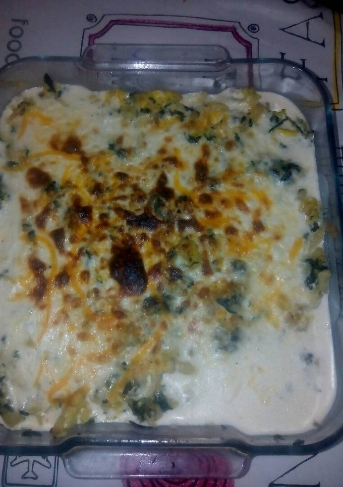 Una foto de Bacalao dorado con espinacas y gratinado 