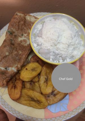 A picture of Fried plantain and egg with akamu (pap).