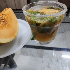 A picture of Muskmelon & Orange mojito.