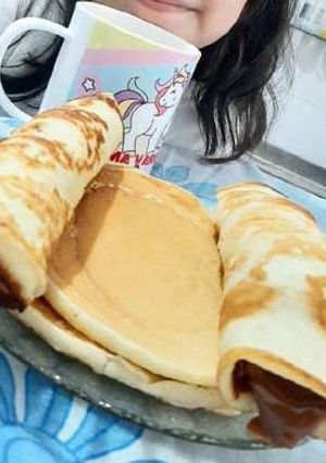 Una foto de Panqueques con dulce de leche