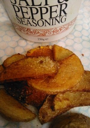 A picture of Salt and pepper seasoning chip wedges.