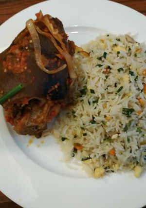 A picture of Stir fry rice and goat meat.