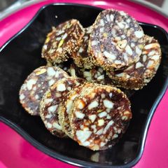 A picture of Dates Pecans dryfruits roll.