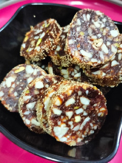 A picture of Dates Pecans dryfruits roll.