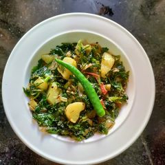 A picture of Palak Aloo Subzi/Spinach Potato Subzi.