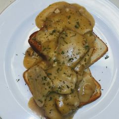 A picture of Open Face Pork Tenderloin w Gravy.