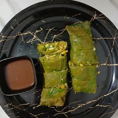 Palak paneer stuffed parcels A picture of Palak paneer stuffed parcels.