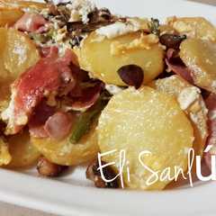 Una foto de Revuelto de papas, Trigueros, champiñones y jamón