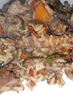 Una foto de Hígado y riñón con arroz