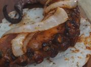 Una foto de pulpo a la mantequilla