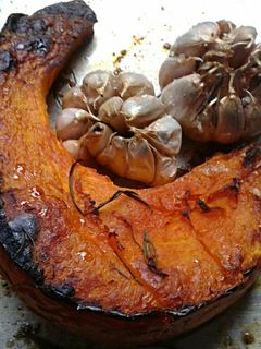 Una foto de Zapallo y Ajos Asados al Horno