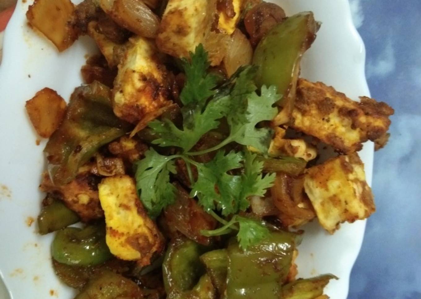 Dry chili paneer with soy sauce in deep fryer