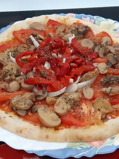 Una foto de Pizza de verduras