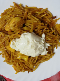 Una foto de Fideo seco con pulpo, gibia o calamar