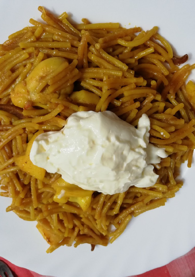 Una foto de Fideo seco con pulpo, gibia o calamar