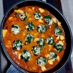 Spinach Malfatti (Spinach Paneer Balls in Roasted Bell Pepper & Walnut Gravy) A picture of Spinach Malfatti (Spinach Paneer Balls in Roasted Bell Pepper & Walnut Gravy).