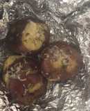 Papas al horno con finas hierbas y queso palmesano