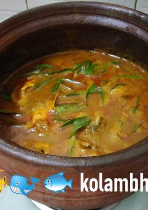 A picture of Fish curry in mud pot.