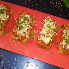 A picture of Tomato Corn Rusk Toast.