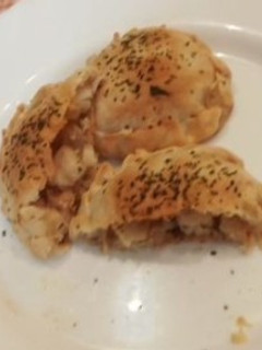 Una foto de Empanadillas de pollo y cebolla caramelizada