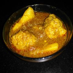 A picture of Mutton mince kofta potato gravy.