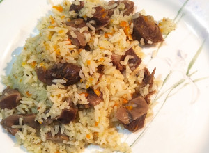 Una foto de Arroz con Mollejas