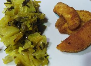 Foto principal de Pollo rebozado con col salteada