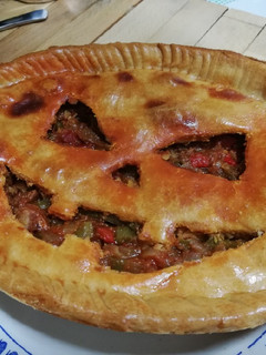 Una foto de Empanada de pimiento y chorizo terrorífica🎃