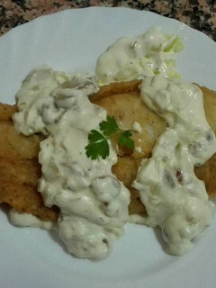 Una foto de Panga con salsa de orégano