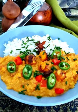 Une photo de Dahl de lentilles corail et butternut roti