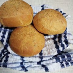 A picture of Homemade hamburger buns.